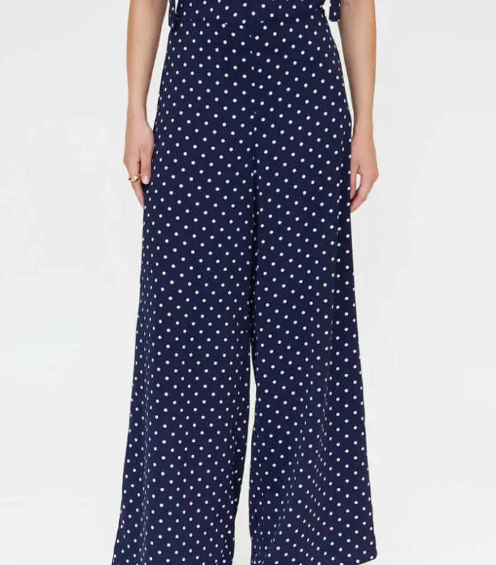 Calça azul marinho com estampa de bolinhas pequenas